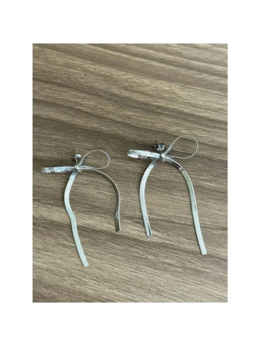 Silver Bow Drop Earrings Q1037